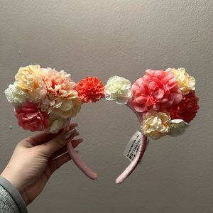 Flower, Minnie mouse, yours. Worn once.
